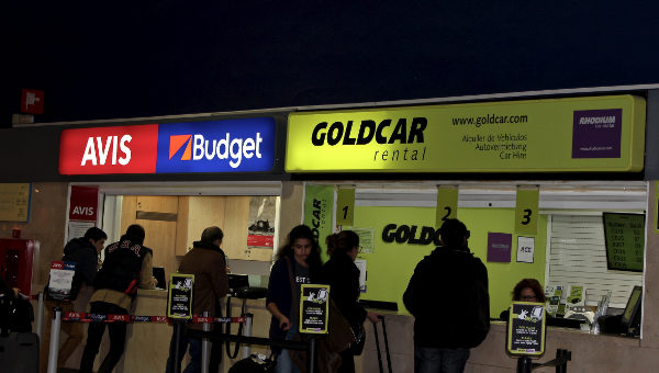 Avis, Budget, and Goldcar Car hire desks at Seville Airport